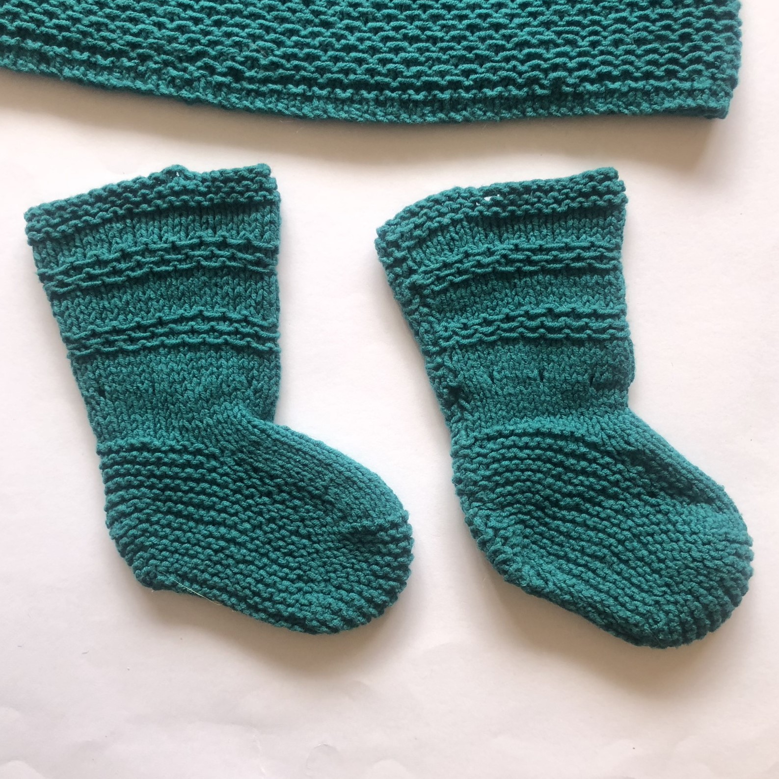 manos obreras, mujeres artesanas, la paz bolivia, artesanias, tejido, bebes, niño, niñas, lana, algadón, ropa bebe