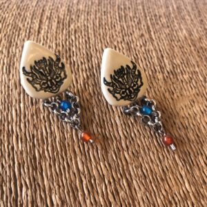 manos obreras, mujeres, artesanas, artesanías, hecho a mano, la az, bolivia, aretes , cerámica.