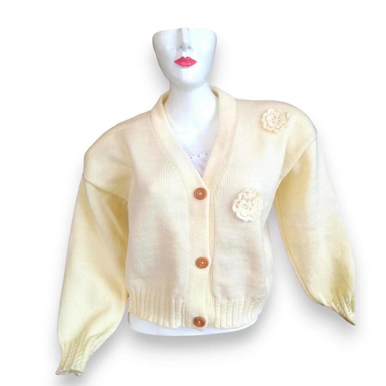 manos obreras, la paz, bolibia, mujeres, atesanos, artesanías, tejidos. saco, palillo,